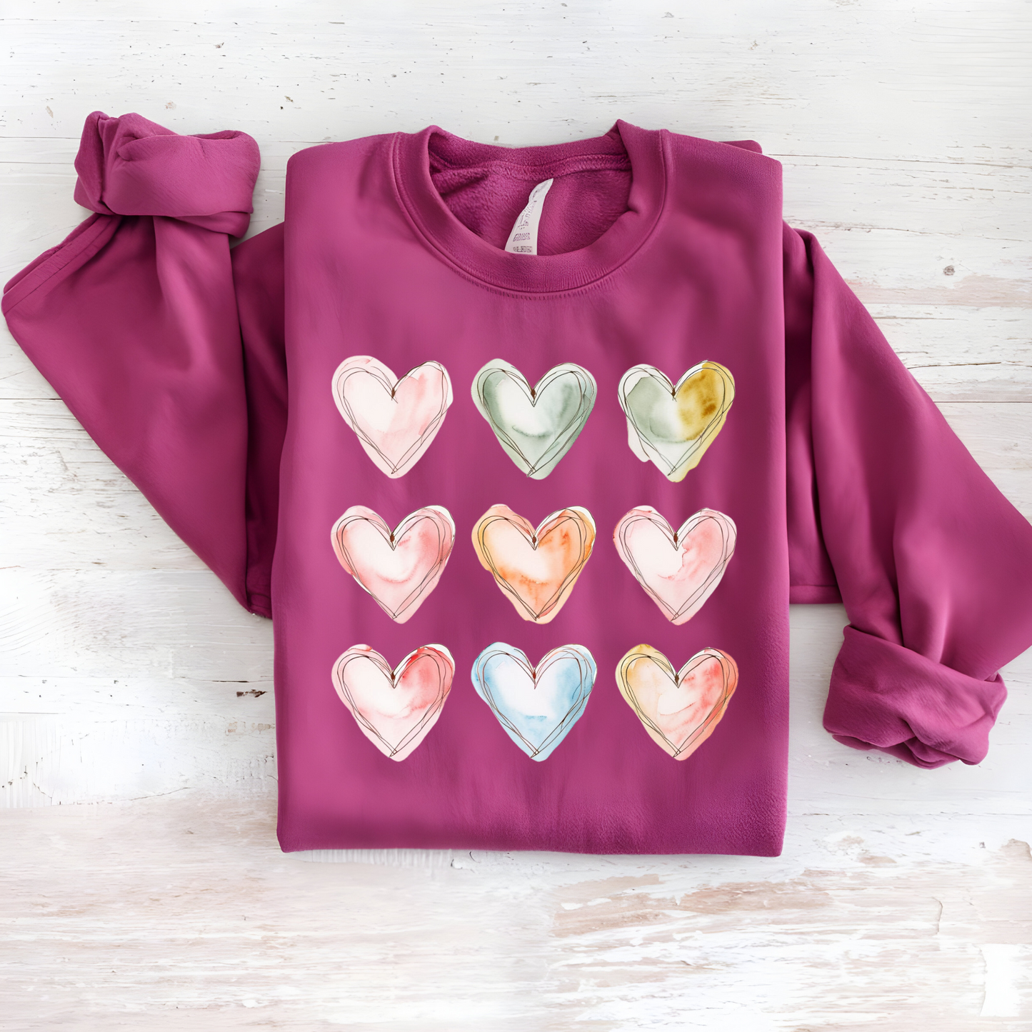 Watercolor Hearts Sweatshirt – Cute and cozy love-themed pullover in pastel shades.