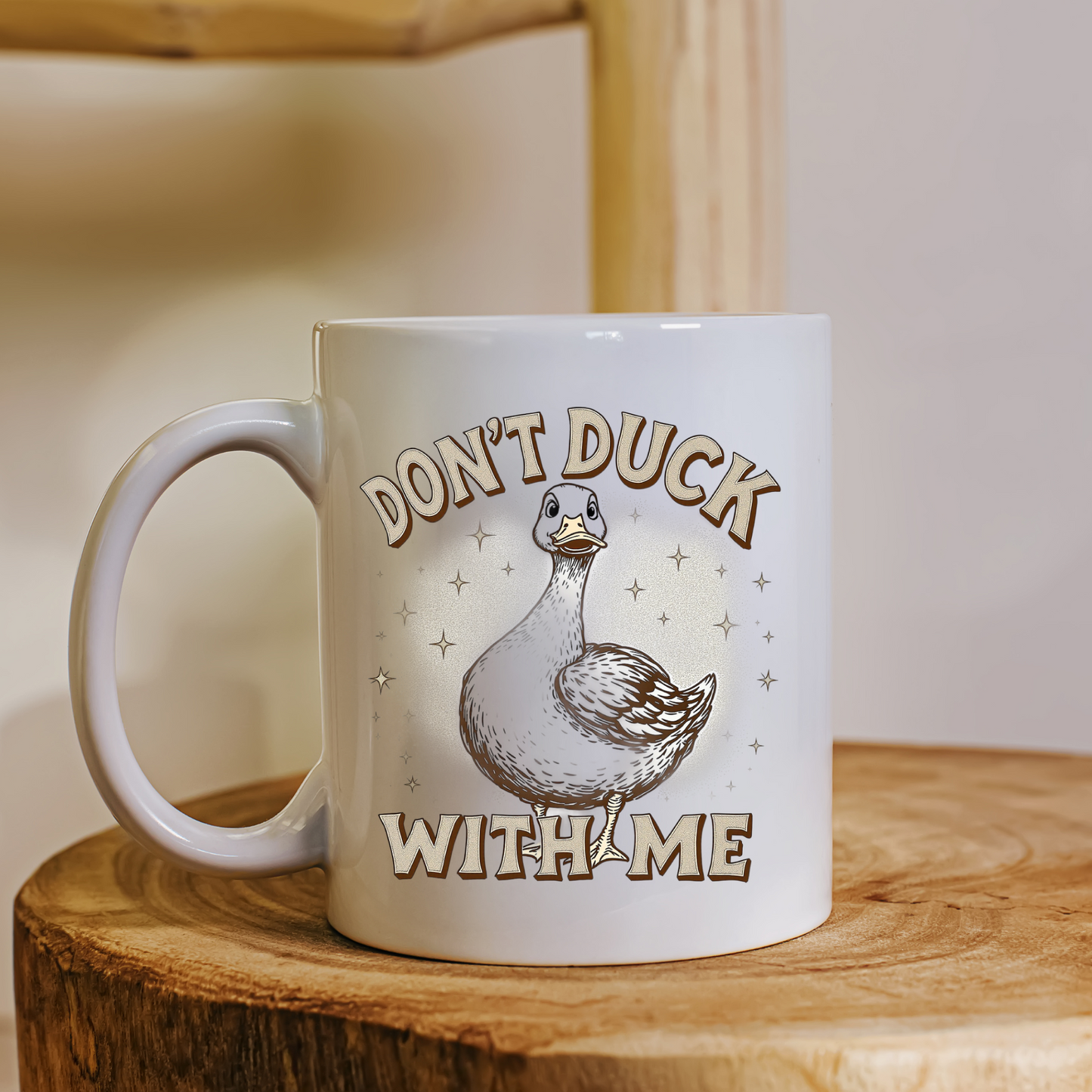 Close-up of the quirky duck illustration and sarcastic message on the ceramic coffee mug.