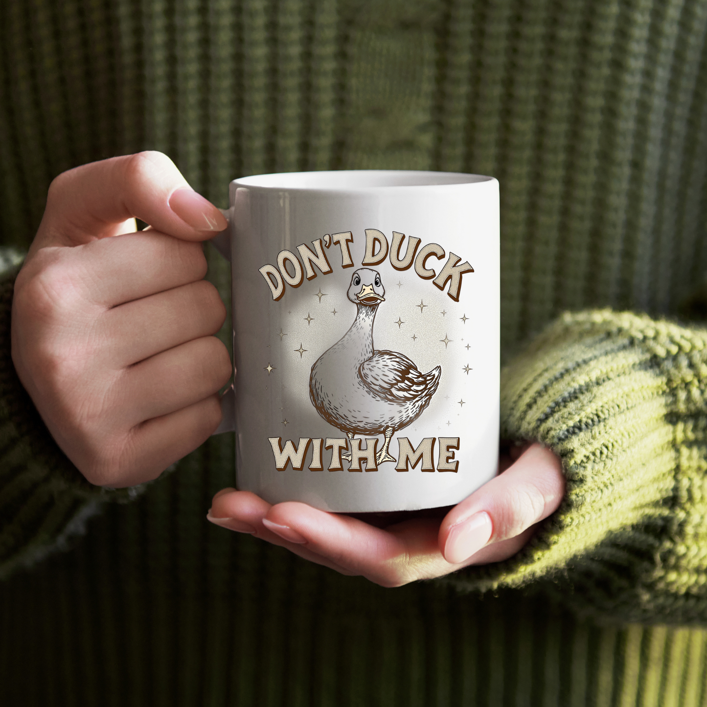 Detailed view of the comfortable C-handle and glossy finish of the 'Don’t Duck With Me' mug.