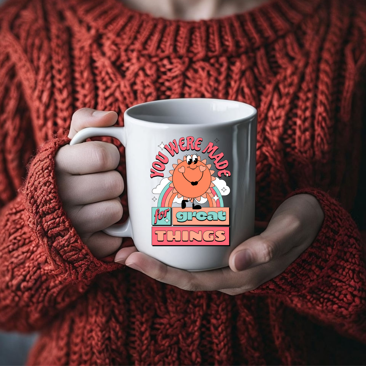 Hands holding the mug, filled with a warm drink for a cozy, uplifting moment.